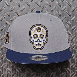 New Era Milwaukee Brewers Cerveceros Sugar Skull 2Tone 9FIFTY Snapback Hat Grey Navy 70851129